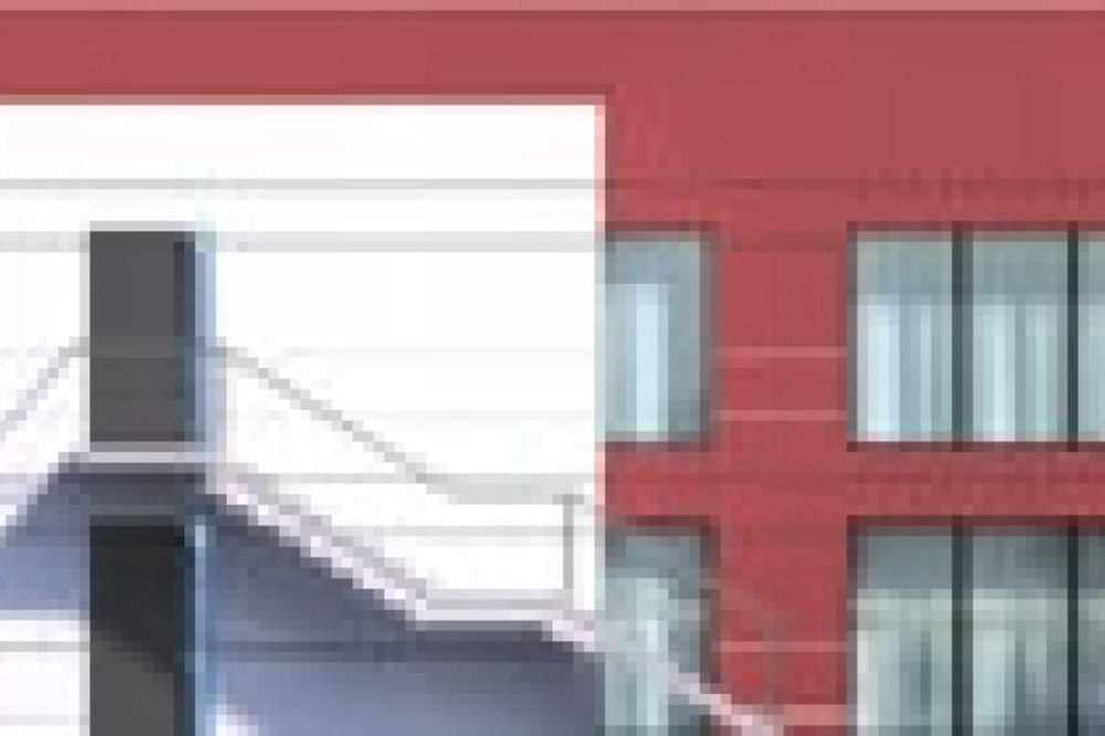 Projekt hotelu K-96, dwukondygnacyjny, niepodpiwniczony, bez garażu - elewacja lewa
