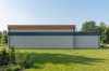 Projekt myjni samochodowej K-148, parterowy, bez podpiwniczenia i bez garażu  - wizualizacja elewacji ogrodowej