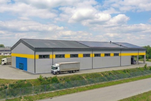 Projekt budynku magazynowo - handlowego K-160, parterowy, bez podpiwniczenia, bez garażu - wizualizacja elewacji ogrodowej