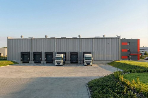 Projekt budynku magazynowo - produkcyjno - biurowego K-146, hala magazynowa jednokondygnacyjna, część biurowa trzykondygnacyjna, budynek niepodpiwniczony - wizualizacja elewacji