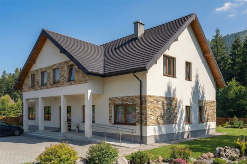 Projekt budynku noclegowego K-61 B, parterowy z poddaszem użytkowym, częściowo podpiwniczony, bez garażu - wizualizacja elewacji prawej