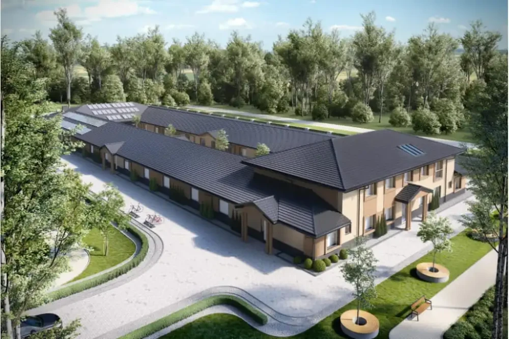 Projekt domu opieki dla osób starszych K-80, parterowy z piętrem na części budynku, niepodpiwniczony - kolorystyka wersja 1