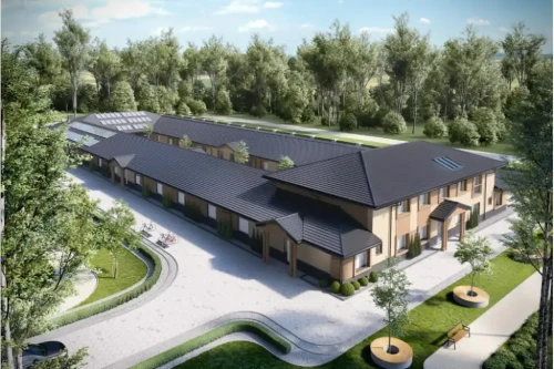 Projekt domu opieki dla osób starszych K-80, parterowy z piętrem na części budynku, niepodpiwniczony - kolorystyka wersja 1