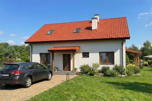 Projekt domu Prista DM-6822, parterowy z poddaszem mieszkalnym, bez podpiwniczenia  - wizualizacja elewacji ogrodowej