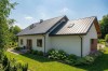 Projekt domu Adra 2 L-6856, parterowy, niepodpiwniczony,  z garażem dwustanowiskowym - wizualizacja elewacji prawej