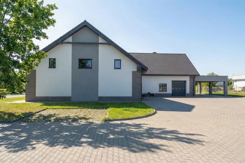 Projekt budynku usługowego LK-156, parterowy z poddaszem użytkowym, bez podpiwniczenia - wizualizacja elewacji frontowej