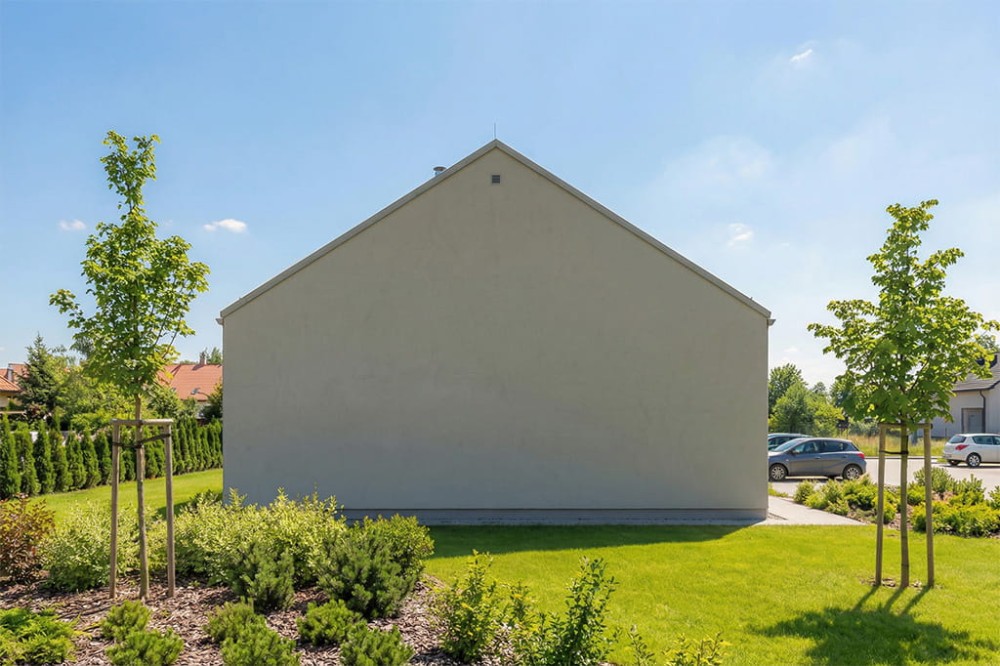 Projekt budynku usługowego (stomatologia) LK-162, parterowy ze strychem nieużytkowym na części budynku, bez podpiwniczenia i bez garażu - wizualizacja elewacji ogrodowej