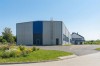 Projekt budynku usługowego z częścią magazynową K-153, Część biurowa / usługowa - podpiwniczona, część magazynowa - niepodpiwniczona  - wizualizacja elewacji prawej