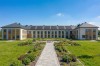 Projekt budynku ZOL z przychodnią rehabilitacyjną i apteką K-157, piętrowy bez garażu i podpiwniczenia - wizualizacja elewacji ogrodowej