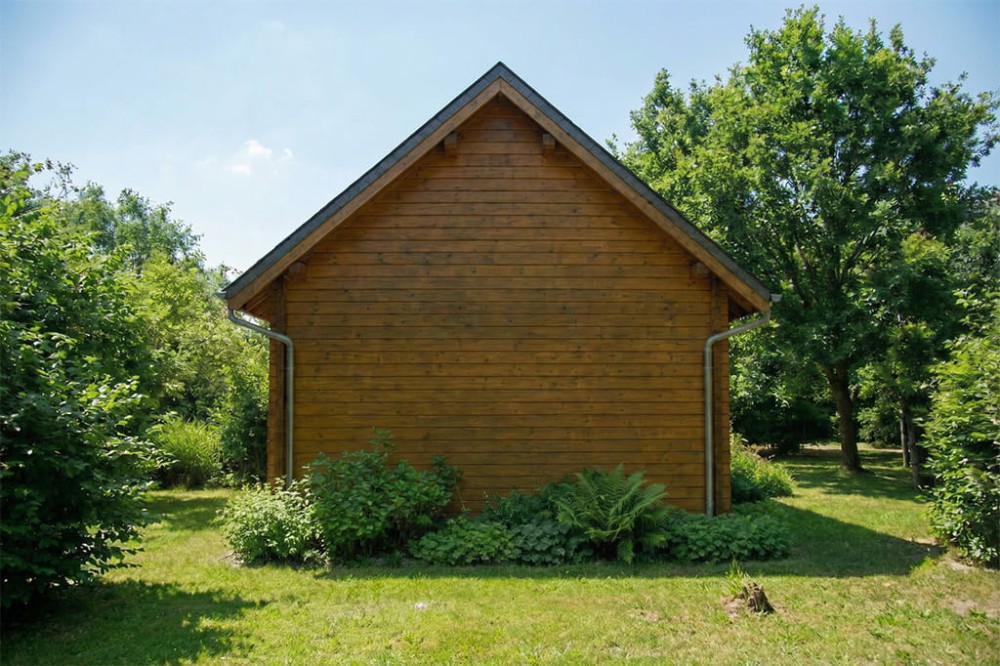 Projekt domu Zenna S DM-6818 S, sezonowy, parterowy z użytkowym poddaszem, niepodpiwniczony - wizualizacja elewacji