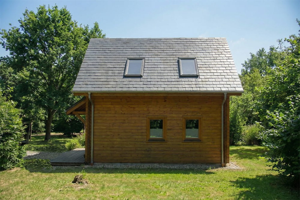 Projekt domu Zenna S DM-6818 S, sezonowy, parterowy z użytkowym poddaszem, niepodpiwniczony - wizualizacja elewacji