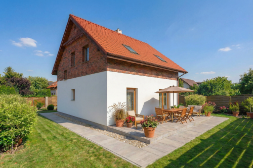 Projekt domu Trimon DM-6881, parterowy z poddaszem użytkowym, bez garażu, bez podpiwniczenia - wizualizacja elewacji ogrodowej