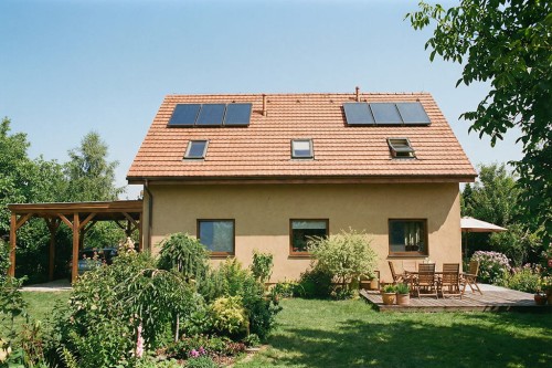 Projekt domu Aveno DM-6911, parterowy z poddaszem użytkowym, niepodpiwniczony, bez garażu - wizualizacja elewacji ogrodowej