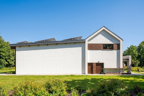 Projekt krytego basenu z częścią mieszkalną  LK-176, częściowo podpiwniczony, z dwiema kondygnacjami nadziemnymi: parterem oraz piętrem - wizualizacja elewacji ogrodowej