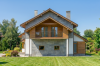 Projekt domu Cereda DM-6465, parterowy z użytkowym poddaszem, niepodpiwniczony, z garażem dwustanowiskowym - wizualizacja elewacji prawej