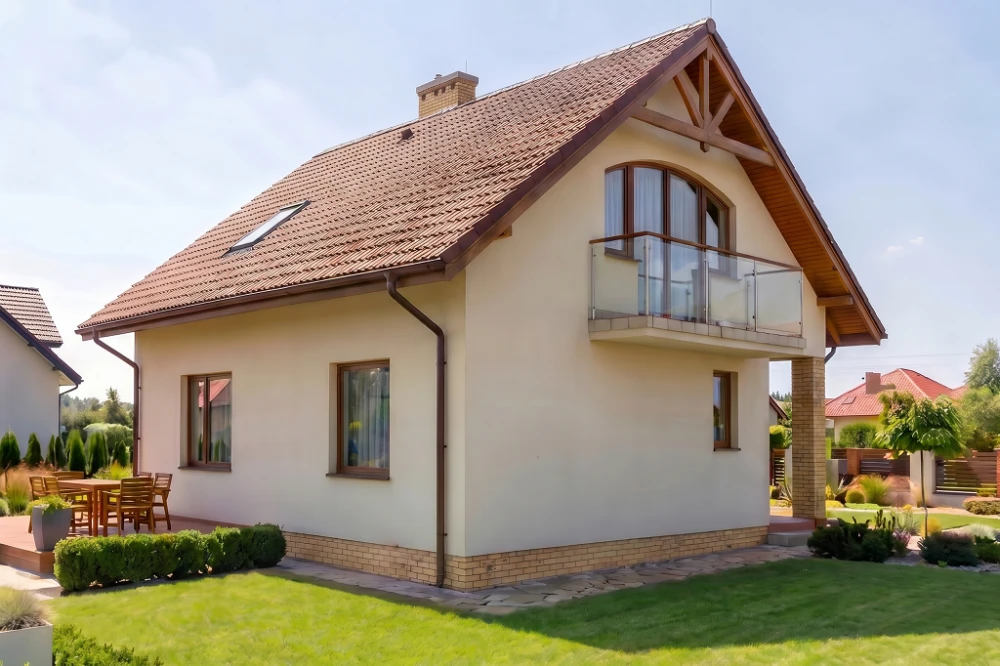 Projekt domu Laskowice L-6254, parterowy z poddaszem mieszkalnym, częściowo podpiwniczony, bez garażu - wizualizacja elewacji lewej