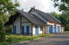 Projekt warsztatu samochodowego K-60 B, parterowy, niepodpiwniczony, zaprojektowany w technologii tradycyjnej murowanej - wizualizacja elewacji lewej