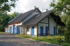 Projekt warsztatu samochodowego LK-60 B, parterowy, niepodpiwniczony, zaprojektowany w technologii tradycyjnej murowanej - wizualizacja elewacji lewej