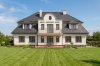 Projekt domu Frombork L-6281, piętrowy z poddaszem mieszkalnym, z dwoma garażami, bez podpiwniczenia -  wizualizacja elewacji ogrodowej