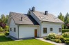 Projekt domu Gerberów S 2 L-6612 S, parterowy z poddaszem użytkowym, niepodpiwniczony, z garażem, w technologii szkieletowej drewnianej - wizualizacja elewacji ogrodowej