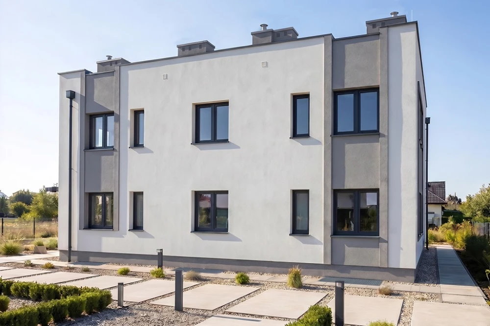 Projekt domu Vicus tech. DM-6913 tech., jednorodzinny dwulokalowy, podpiwniczony, o trzech kondygnacjach - wizualizacja elewacji ogrodowej