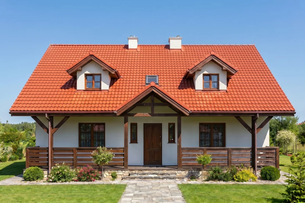 Projekt domu Wolanów tech. DM-6175 tech., parterowy z poddaszem mieszkalnym, podpiwniczony z garażem, z wydzieloną częścią gospodarczą - wizualizacja elewacji frontowej