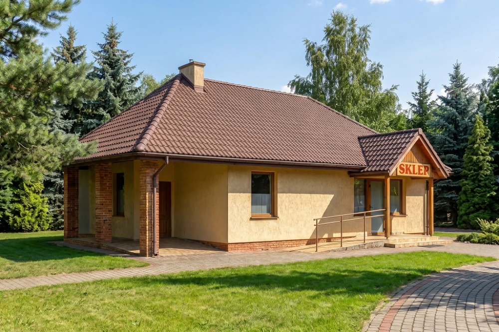 Projekt sklepu K-05, budynek parterowy, niepodpiwniczony - wizualizacja elewacji lewej