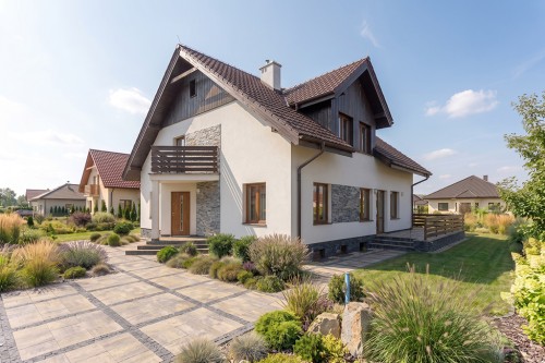 Projekt domu Ciepielów tech. DM-6194 tech., parterowy z poddaszem mieszkalnym, częściowo podpiwniczony - wizualizacja elewacji frontowej